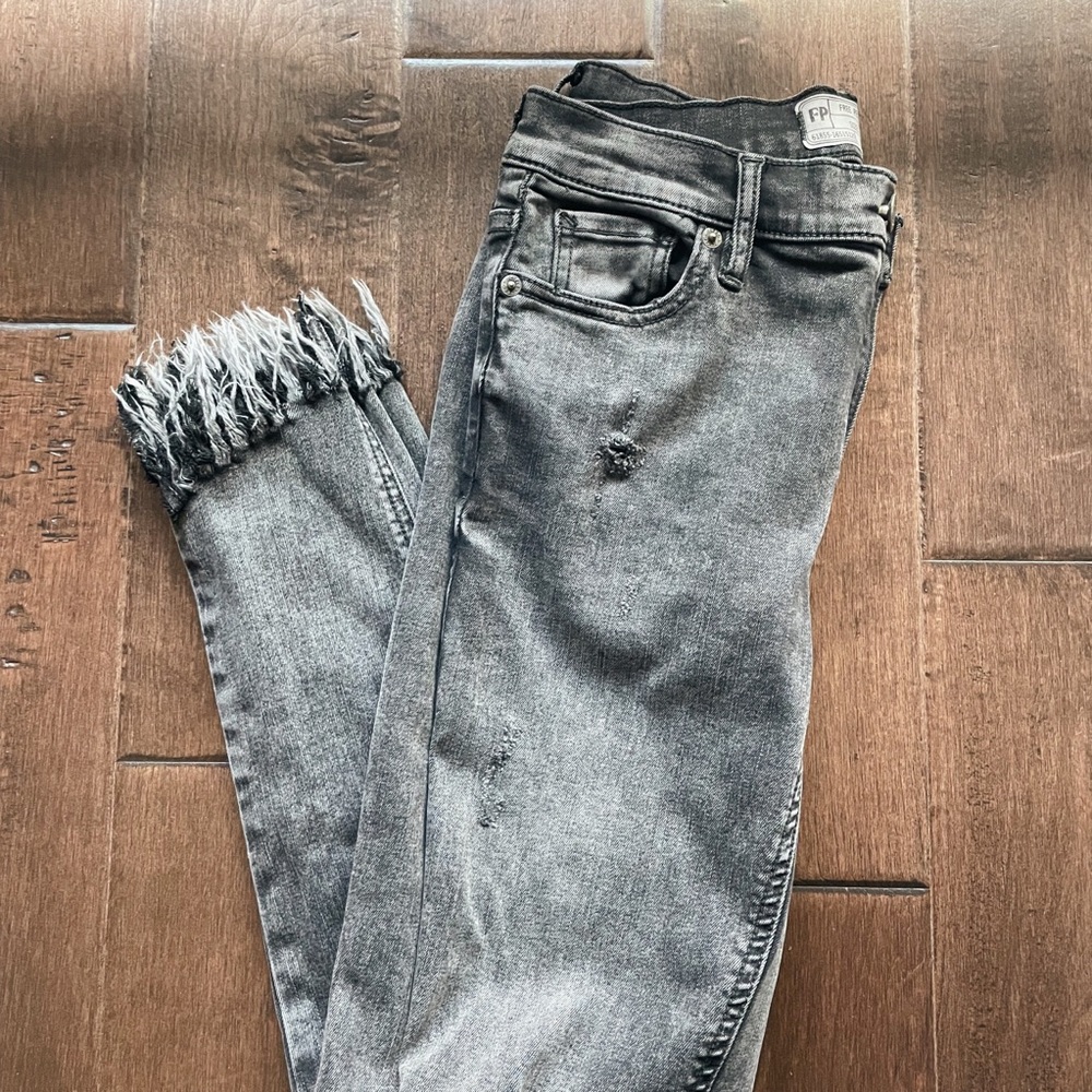 free people ripped hem distressed gray skinny jeans